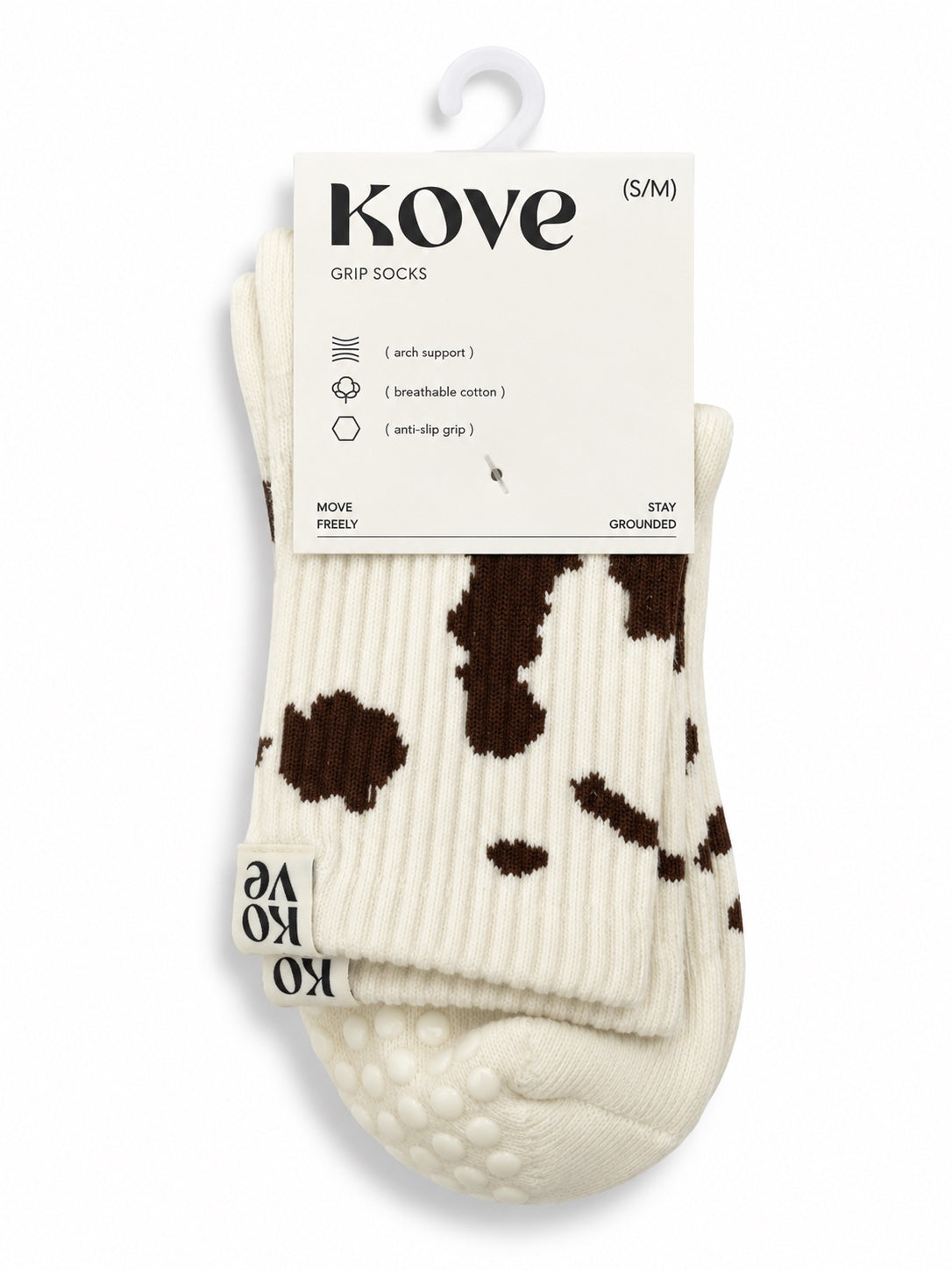 Cream and brown cow print grip socks