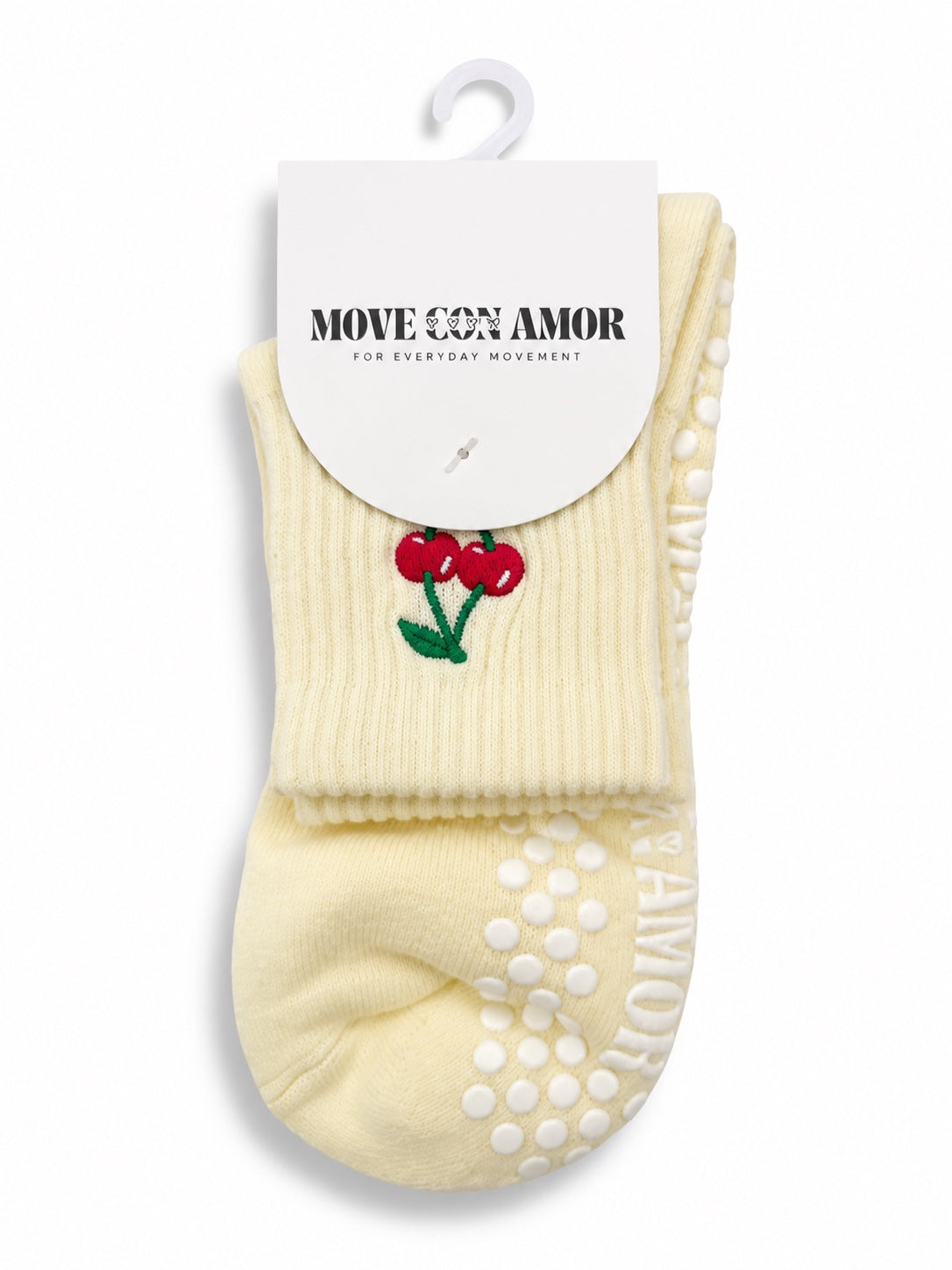 Pale yellow grip socks with embroidered cherries